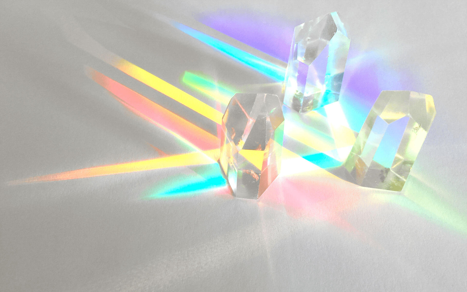 Energy Healing Crystals with colors of the chakras coming out of them